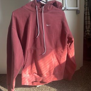 Used pink Nike sweatshirt - Size adult medium - runs small - good for teens